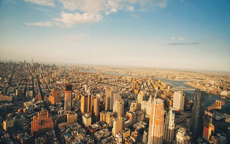 One World Trade Center Observatory View - New York City Skyline - Midtown | The views from the new observatory at the top of One World Trade Center (still lovingly referred to as the Freedom Tower ) are nothing short of breath-taking.

Taken yesterday over the span of an hour as the sky and the light changed drastically.

You can practically see the curvature of the earth from up there.

----


 Tons of information about my <a href="http://www.amazon.com/gp/product/1440339589/ref=as_li_tl?ie=UTF8&amp;camp=1789&amp;creative=9325&amp;creativeASIN=1440339589&amp;linkCode=as2&amp;tag=nyththle0e-20&amp;linkId=ER6GYT5FRYNMEPLF" rel="nofollow">New York photography book</a> with sample pages (including where to order and what stores are carrying it) here:

<a href="http://nythroughthelens.com/post/92873566010/ny-through-the-lens-the-book-i-am-super" rel="nofollow">NY Through The Lens: A New York Coffee Table Book</a>
---


View my New York City photography at my website <a href="http://nythroughthelens.com/" rel="nofollow">NY Through The Lens</a>.

View my Travel photography at my travel blog: <a href="http://travelinglens.me/" rel="nofollow">Traveling Lens</a>.

Interested in my work and have questions about PR and media? Check out my:

<a href="http://nythroughthelens.com/about" rel="nofollow">About Page</a> | <a href="http://nythroughthelens.com/PR" rel="nofollow">PR Page</a> | <a href="http://nythroughthelens.com/media" rel="nofollow">Media Page</a>