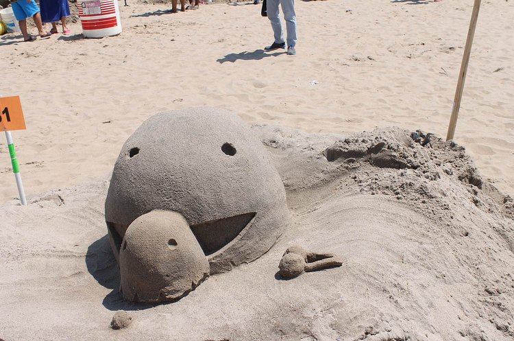 Pac man eating a ghost, by Cassundra Wright.