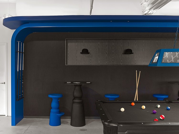A Pool Room Decorated with Bowler Hats