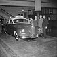 G.H. Brodie, Assistant to the President of Packard Motor Car Co.; Sam Abramson, President of Yale Taxi Co. in New York; and Robert King, President of Packard Federal Corp. (left to right), pictured with the first postwar taxi, in 1946. One of its features was fitting five forward-facing passengers without the usual "jump seats."