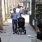 Man with stroller, 12th St., March 12, 2012.