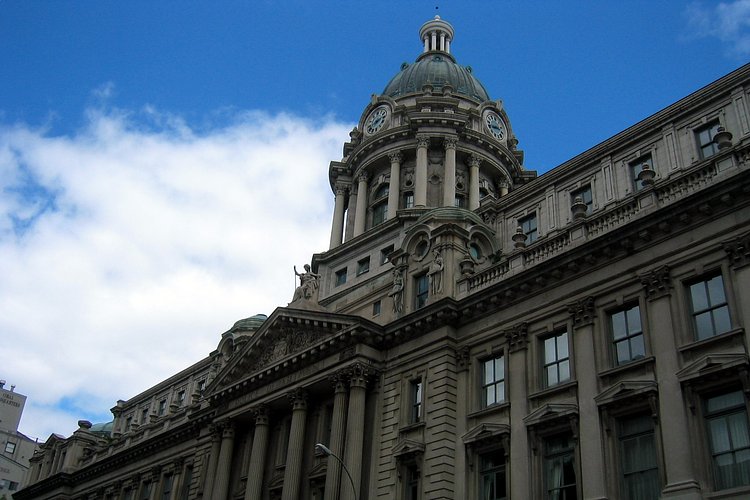 NYC - Little Italy: Police Building | The Police Building Apartments, formerly the Police Headquarters Building, at 240 Centre Street, was built in 1905-09 to the design of Hoppin, Koen &amp; Huntington.  Following the creation of Greater New York in 1898, the city's police department expanded rapidly and a large new headquarters building was planned.  In 1905 Mayor George McClellan laid the cornerstone of this limestome-faced, steel-framed Edwardian Baroque/Beaux-Artspalace capped with a tall dome.  When the Police Department relocated in 1973, there was talk of turning it into everything from a hotel to a community center for Little Italy.  In 1983 a development group converted the building into luxury apartments.

The Police Building Apartments were designated a landmark by the New York City Landmarks Preservation Commission in 1978. 

National Register #80002690 (1980)