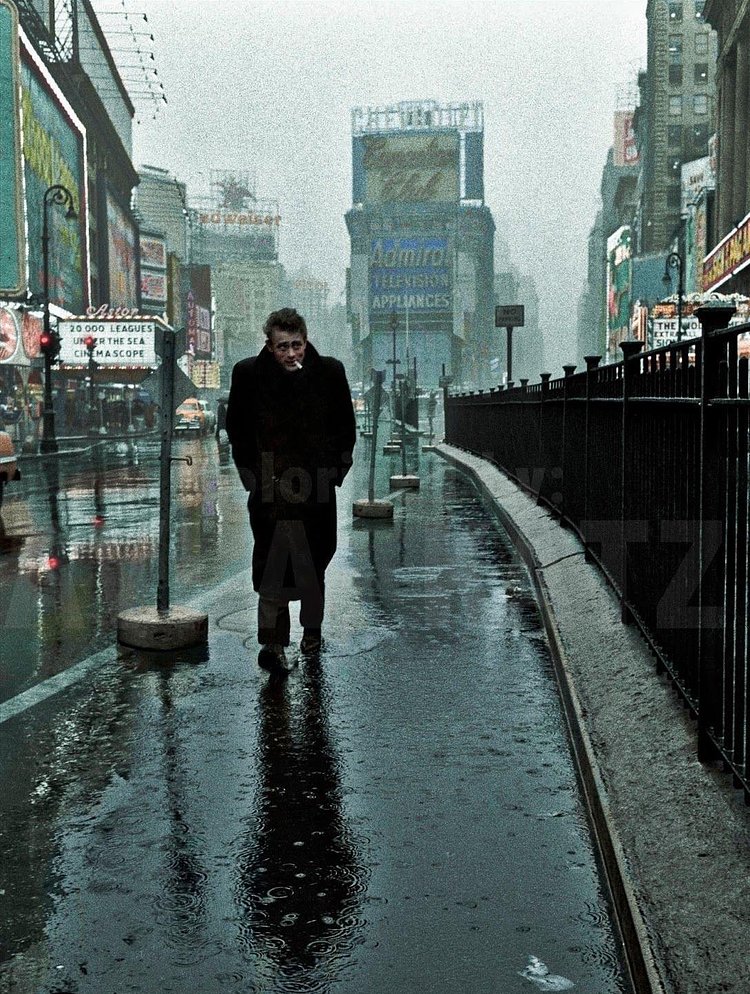 Actor James Dean on a rainy day in Times Square, 1955