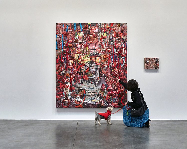The color red is not visible to a dog's eyes, however this didn't stop Rocky from an interest in the surface and textures of this Elliott Hundley painting on view at Andrea Rosen Gallery.