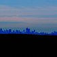 Mountain view of the city from 28.57 miles away