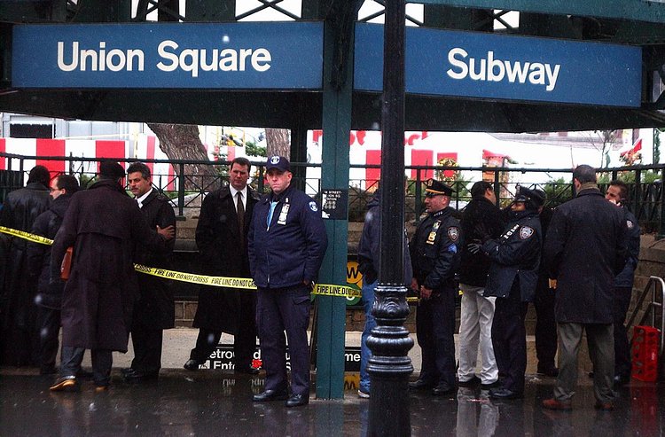 2000's: With 9/11 still fresh in the minds of many, cops crowded the entrance to the subway station at Union Square in 2002 after 20 to 30 suspicious packages emblazoned with the word 'fear' were found. Emergency services, the bomb squad and crime scene units were called to the scene.