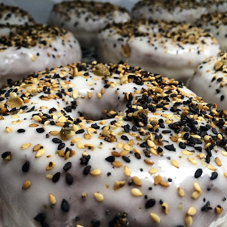 This is our new Everything Doughnut: Cream Cheese Glaze with Sesame Seeds, Poppy Seeds, Pepitas, Garlic & Sea Salt. 😋🍩 #TDPNYC #doughnuts #donuts #yum #nyc #newyork #everything #instadaily #instafood #instagood #fun #smile #westvillage #monday #wemakefun #enjoy #food #foodie