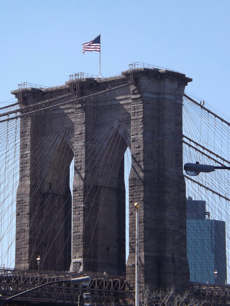 #NYCDOT raises new American flags on top of the #BrooklynBridge today, a refreshing sight after this bitter winter http://t.co/oQD4qosTAl