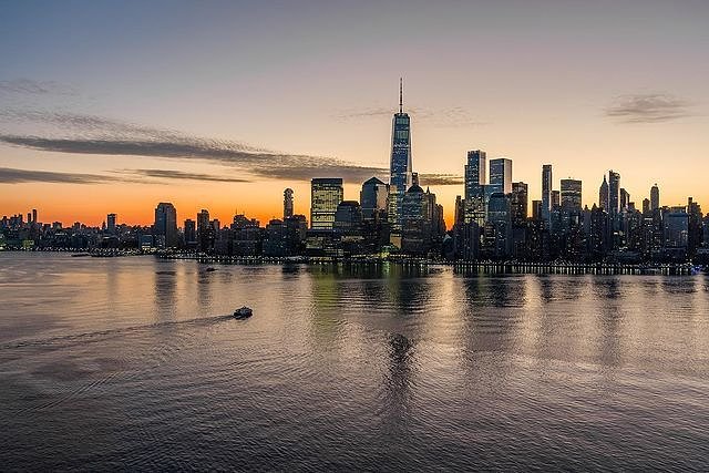 Sunset over New York Harbor and Lower Manhattan Skyline