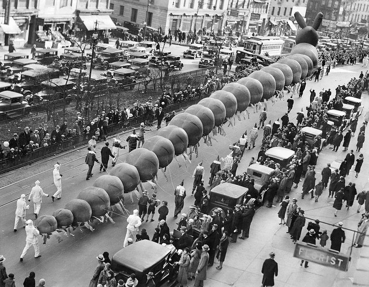 Dec. 8, 1929: A centipede-like creation comprising several balloons during the annual parade put on by “R.H. Macy & Co.” was set to fly into the sky at the parade’s conclusion. The balloon animal was designed by Tony Sarg, a puppeteer whose name was associated with the parade in the early days — “designed grotesque balloons in annual Macy parade,” his obituary read.