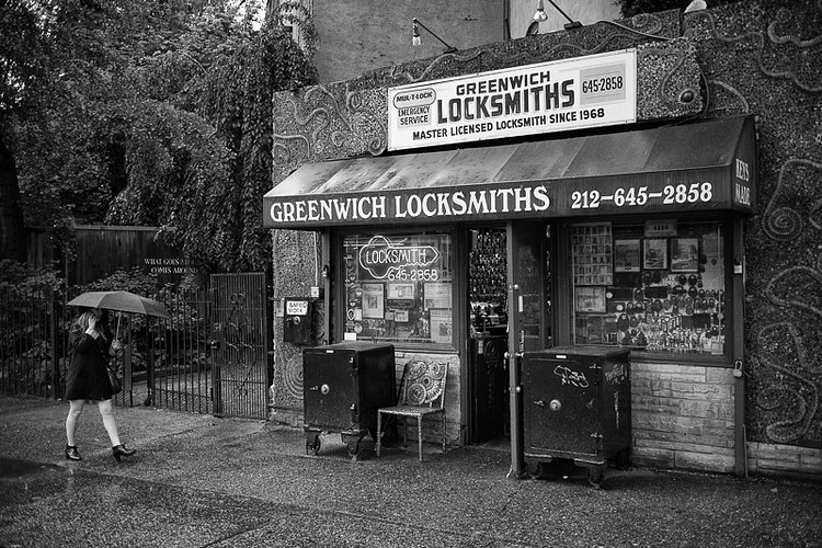 Waiting underneath an umbrella