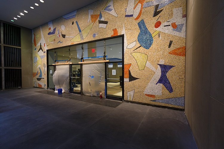 Construction workers discovered a mosaic mural by Max Spivak in the entryway to 5 Bryant Park in March. It will be preserved as part of the new lobby.