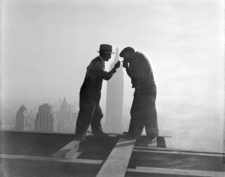 Two Smokers on top of RCA Building, Rockefeller Center, 1932.