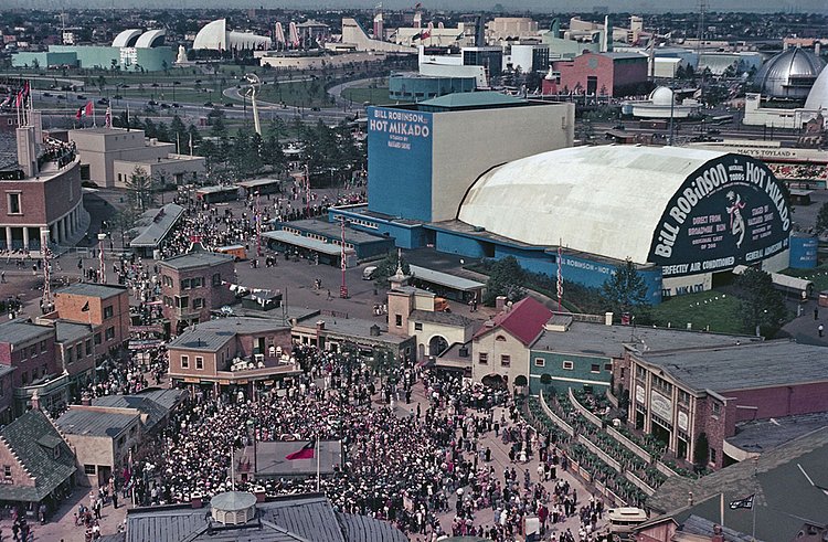 An aerial view of the fair shows the music hall advertising Hot Mikado with Bill Robinson.