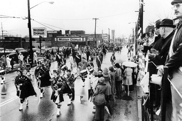 The Staten Island Pipers play their tune near Forest Avenue Shoppers Town at the borough's St. Pat's Parade, 1977.