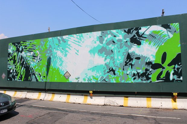 A blue-green scene reminiscent of leaves and sky is depicted by artist Naomi Reis.