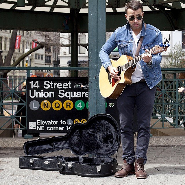Chris Leamy busks to help the homeless