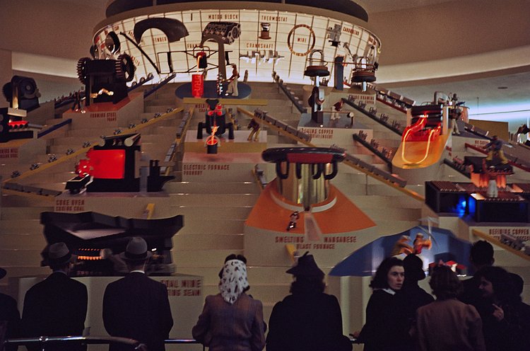 Ford car parts displayed inside its pavilion.