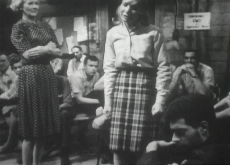 A still from the 1964 government produced film, Public Shelter Living: The Story of Shelter 104, which dramatized fallout shelter living.