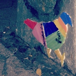 Pigeon 51 - E. 7th St between Ave A & B. #pigeon #eastvillage #tomkinssquarepark #nyc #streetlight #streetart #original #glass #art #nycstreetart #birdup #thegluedriesclear #wheatpaste #graffiti #thestreetsofnyc #colorful #streetlightpigeon #gbpigeonnyc #gbwashere