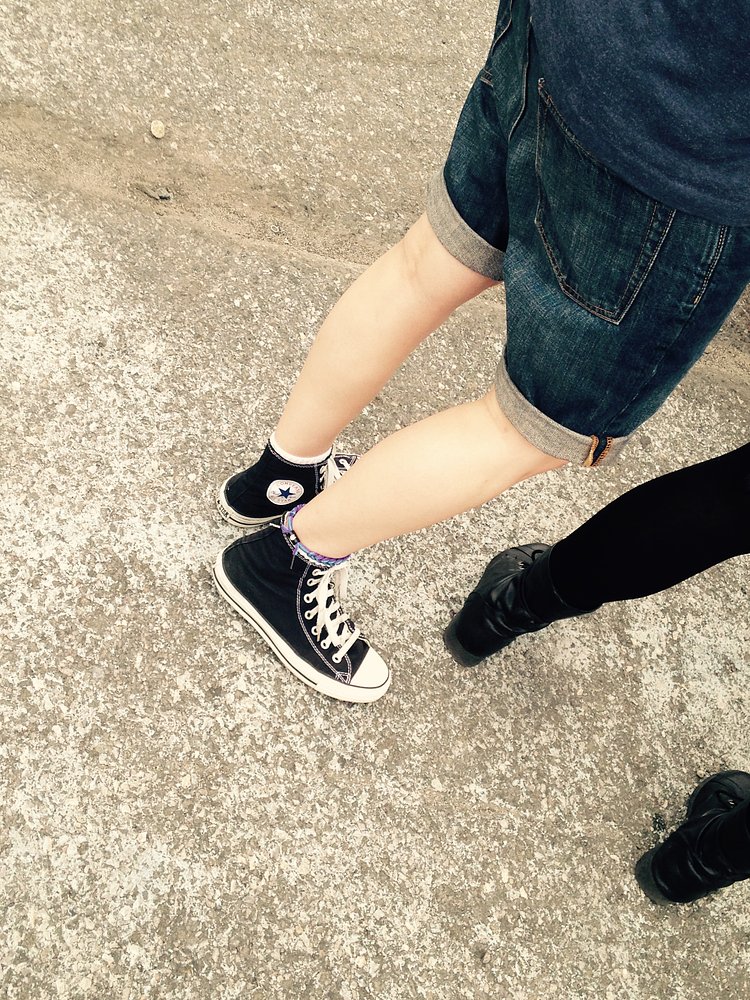 90s Fest attire included flannels, converse sneakers, crop tops, chokers Astronaut suits, Pokemon beanies and more converse!