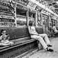Little girl reads a book on the 1 train, summer of 1981