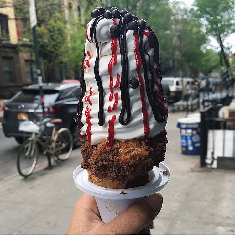 coneCHURRO!® NYC! 1:30pm - midnight, daily.  Lookout for additional MAY FLAVORS!! *Banana Brûlée *Strawberry Shortcake, *Nutella S'mores Galore!!! Pictured: choco raspberry.  Photo cred: xkar3nnx.  ChikaLicious NYC .
JHERI CURL - sea salt caramel coated inner cone, cinnamon struessel rim with sea salt caramel drizzle.

NUTTY PROFESSOR:  nutella smeared "inner" cone with brown sugar pecan rim, world's tastiest tahitian vanilla bean soft serve with toasted almonds, nutella drizzle and frosted pecan top.

TWINKLE SPRINKLES:  66% Valrhona caribe chocolate ganache coated inner cone with happy dance rainbow sprinkles.

POINDEXTER:  66% Valrhona caribe chocolate ganache coated inner cone with happy dance rainbow sprinkled RIM.

CHOCO-RASPBERRY SUNDAE:  chocolate ganache/raspberry jam filling, chocolate struessel rim, raspberry and chocolate sauce drizzle. 
GREEN ENVY:  red bean inner cone, green tea struessel rim, green tea/vanilla swirl, red bean top. 
204 E. 10th st. @2nd Ave., NYC, BITCHESSSZz.  conechurro.com
