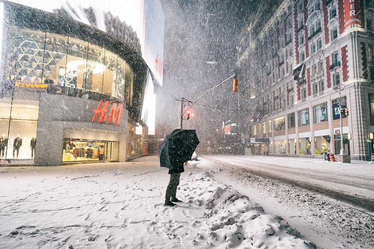 New York City - Snow - Winter Storm Juno - Times Square | Juno: The first snowstorm of 2015 in New York City.

---

(Note: My <a href="http://www.amazon.com/gp/product/1440339589/ref=as_li_tl?ie=UTF8&amp;camp=1789&amp;creative=9325&amp;creativeASIN=1440339589&amp;linkCode=as2&amp;tag=nyththle0e-20&amp;linkId=ER6GYT5FRYNMEPLF" rel="nofollow">New York photography book</a> released worldwide in stores/online recently and has photos similar to this  [full info below])

---

I have been photographing New York City during snowstorms at night for the past 5 years. When it comes to experiencing <a href="http://nythroughthelens.com/tagged/snow" rel="nofollow">New York City in the snow</a>, I relish the challenge. The more gusty, snowy, and brutal the storm, the more of a chance that I will be out in it traipsing around New York City with my cameras in tow.

When I heard that the MTA was suspending all transit service (and most vehicles) at 11 pm, I made the decision to take the train up to the Upper East Side prior to 11 pm to deposit myself up there with the intention of walking from the Upper East Side to Times Square and then walking the several miles back to the Lower East Side (whew!!).

The streets were eerily empty.

Emptier than they are usually at night during snowfall. Since there was a ban on all vehicles aside from snow plows and emergency services, there were practically no cars at all on the streets. Even taxis were banned from the streets!

I walked in the middle of avenues and streets that are usually teeming with cars.

There was an eerie sense of calm.

It was magical.


---

This is part of a post that I posted to my NYC photography blog. If you are curious enough to look at the photos there, here is the link to the post:

<a href="http://nythroughthelens.com/post/109291619025/new-york-city-snow-winter-storm-juno-i" rel="nofollow">New York City - Winter Storm Juno</a>


----

* As mentioned above - My New York City coffee table book that released in stores/online worldwide recently.

 Tons of information about my <a href="http://www.amazon.com/gp/product/1440339589/ref=as_li_tl?ie=UTF8&amp;camp=1789&amp;creative=9325&amp;creativeASIN=1440339589&amp;linkCode=as2&amp;tag=nyththle0e-20&amp;linkId=ER6GYT5FRYNMEPLF" rel="nofollow">New York photography book</a> with sample pages (including where to order and what stores are carrying it) here:

<a href="http://nythroughthelens.com/post/92873566010/ny-through-the-lens-the-book-i-am-super" rel="nofollow">NY Through The Lens: A New York Coffee Table Book</a>
---


View my New York City photography at my website <a href="http://nythroughthelens.com/" rel="nofollow">NY Through The Lens</a>.

View my Travel photography at my travel blog: <a href="http://travelinglens.me/" rel="nofollow">Traveling Lens</a>.

Interested in my work and have questions about PR and media? Check out my:

<a href="http://nythroughthelens.com/about" rel="nofollow">About Page</a> | <a href="http://nythroughthelens.com/PR" rel="nofollow">PR Page</a> | <a href="http://nythroughthelens.com/media" rel="nofollow">Media Page</a>