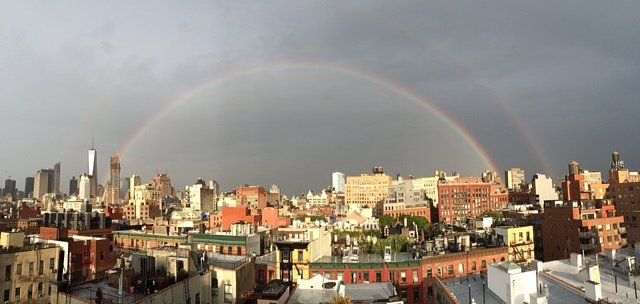 Double Rainbows Form High Above Downtown this Morning