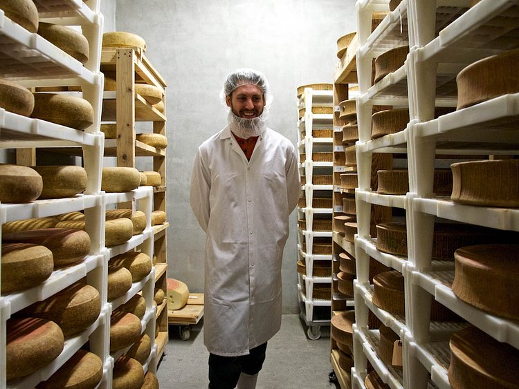 Cavemaster Brian Ralph with his cheeses.