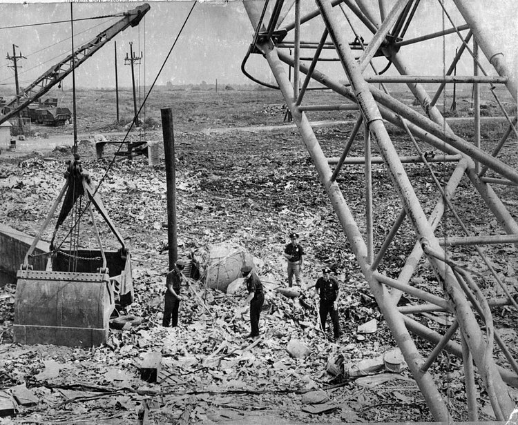 Police look through the garbage in the Fresh Kills dump for a .30 caliber carbine believed to be the weapon used in the killing of three men in the Bronx. Circa 1968.