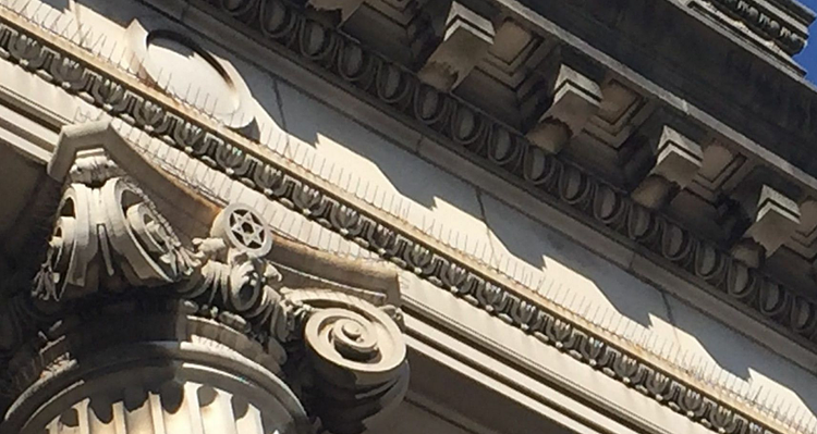 A Star of David decorates a column of Harlem's Mt. Olivet Church, formerly the Temple Israel synagogue.