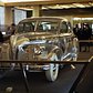 General Motors displays a transparent car in its pavilion. The four-door Pontiac Deluxe Six is clad in Plexiglas.