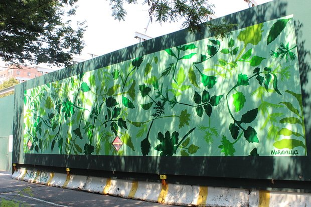 Artist Jennifer Maravillas created a mural depicting lush foliage.