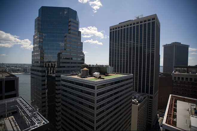 A replica of a British World War I fighter plane sits on the roof of 77 Water Street, a 26-story office tower in Manhattan's Financial District.