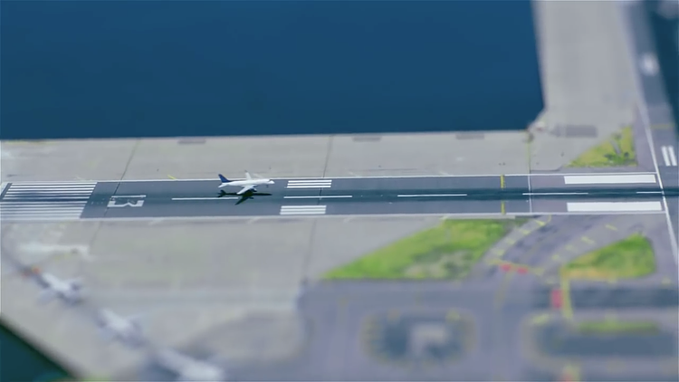 The video then travels to the borough of Queens, where LaGuardia Airport is located. The East River and Rikers Island Channel surround runway 13/31, the longest runway at the airport by just one metre. 