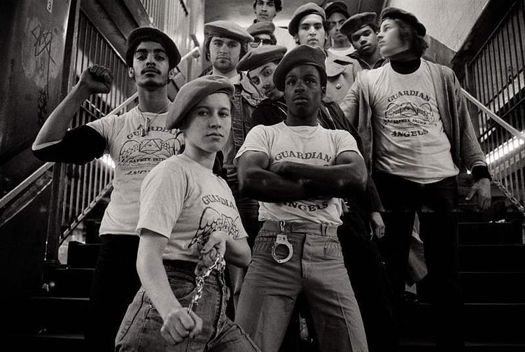 Crime also became a chronic issue for the subway stations at Times Square. Above, a team of the Guardian Angels -- a volunteer patrol group dedicated to making New York's subway system safe -- get ready to go on patrol in 1980.