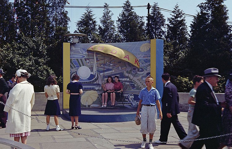 Two women pose on a Kodak posing stand during the 1939 New York World's Fair.