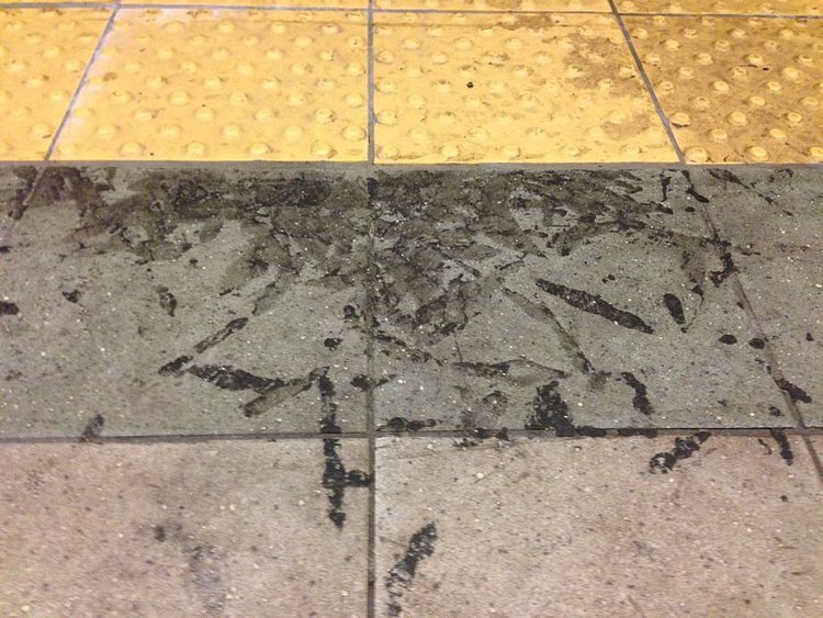 Pile of gunk on a NYC subway after clean-up.