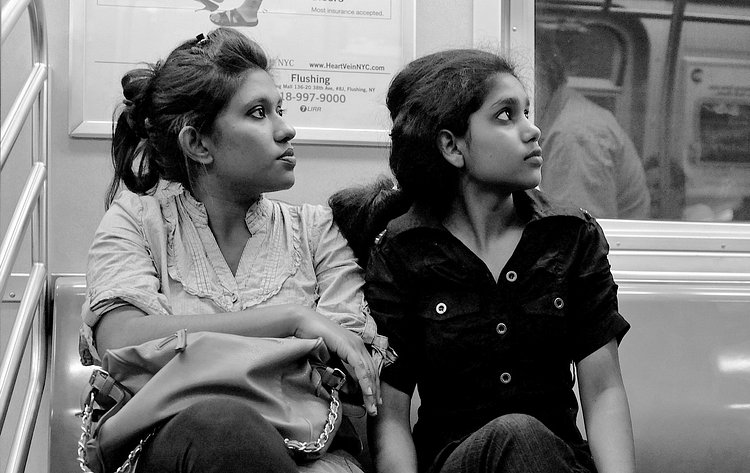 New York Street Scenes | Mother and daughter on the F train.