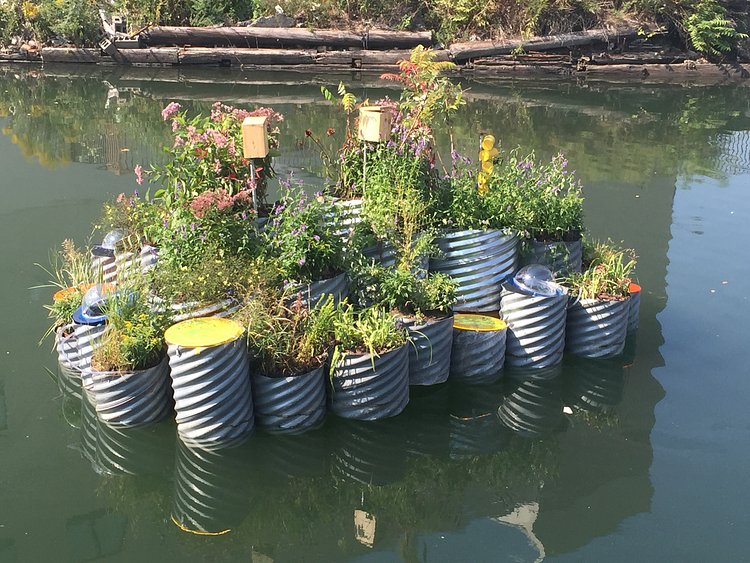 Designed and built by the Balmori design firm, the structure features 19 plant species in metal culvert pipes filled with plastic bottles.