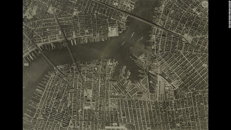 In the days before Google Maps, cities relied on aerial photos to help create street maps (back then they were on paper, kids). This aerial photo of New York was taken in 1924 by the city's Bureau of Engineering