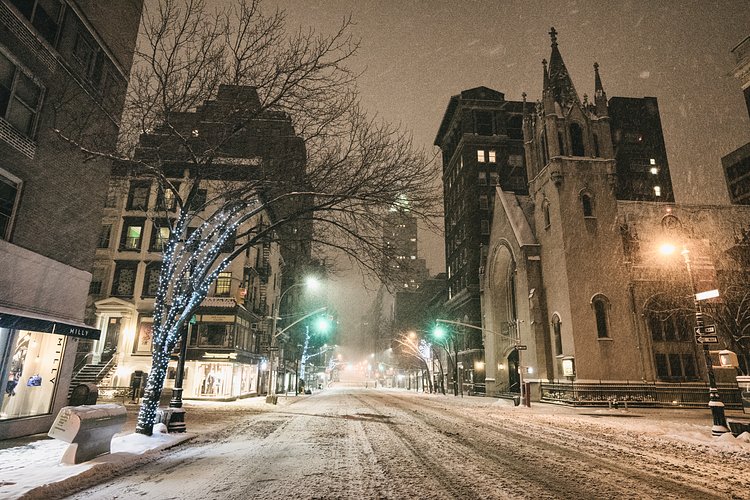 New York City - Snow - Winter Storm Juno - Empty Madison Avenue (1 of 1)-2 | Juno: The first snowstorm of 2015 in New York City.

---

(Note: My <a href="http://www.amazon.com/gp/product/1440339589/ref=as_li_tl?ie=UTF8&amp;camp=1789&amp;creative=9325&amp;creativeASIN=1440339589&amp;linkCode=as2&amp;tag=nyththle0e-20&amp;linkId=ER6GYT5FRYNMEPLF" rel="nofollow">New York photography book</a> released worldwide in stores/online recently and has photos similar to this  [full info below])

---

I have been photographing New York City during snowstorms at night for the past 5 years. When it comes to experiencing <a href="http://nythroughthelens.com/tagged/snow" rel="nofollow">New York City in the snow</a>, I relish the challenge. The more gusty, snowy, and brutal the storm, the more of a chance that I will be out in it traipsing around New York City with my cameras in tow.

When I heard that the MTA was suspending all transit service (and most vehicles) at 11 pm, I made the decision to take the train up to the Upper East Side prior to 11 pm to deposit myself up there with the intention of walking from the Upper East Side to Times Square and then walking the several miles back to the Lower East Side (whew!!).

The streets were eerily empty.

Emptier than they are usually at night during snowfall. Since there was a ban on all vehicles aside from snow plows and emergency services, there were practically no cars at all on the streets. Even taxis were banned from the streets!

I walked in the middle of avenues and streets that are usually teeming with cars.

There was an eerie sense of calm.

It was magical.


---

This is part of a post that I posted to my NYC photography blog. If you are curious enough to look at the photos there, here is the link to the post:

<a href="http://nythroughthelens.com/post/109291619025/new-york-city-snow-winter-storm-juno-i" rel="nofollow">New York City - Winter Storm Juno</a>


----

* As mentioned above - My New York City coffee table book that released in stores/online worldwide recently.

 Tons of information about my <a href="http://www.amazon.com/gp/product/1440339589/ref=as_li_tl?ie=UTF8&amp;camp=1789&amp;creative=9325&amp;creativeASIN=1440339589&amp;linkCode=as2&amp;tag=nyththle0e-20&amp;linkId=ER6GYT5FRYNMEPLF" rel="nofollow">New York photography book</a> with sample pages (including where to order and what stores are carrying it) here:

<a href="http://nythroughthelens.com/post/92873566010/ny-through-the-lens-the-book-i-am-super" rel="nofollow">NY Through The Lens: A New York Coffee Table Book</a>
---


View my New York City photography at my website <a href="http://nythroughthelens.com/" rel="nofollow">NY Through The Lens</a>.

View my Travel photography at my travel blog: <a href="http://travelinglens.me/" rel="nofollow">Traveling Lens</a>.

Interested in my work and have questions about PR and media? Check out my:

<a href="http://nythroughthelens.com/about" rel="nofollow">About Page</a> | <a href="http://nythroughthelens.com/PR" rel="nofollow">PR Page</a> | <a href="http://nythroughthelens.com/media" rel="nofollow">Media Page</a>