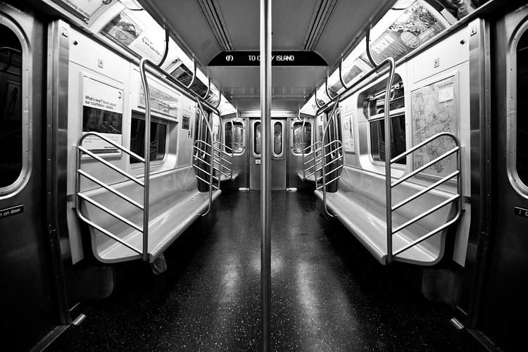 Modern Detachment | It was early in the morning, around 2AM. I just slept pass my stop by one freaking stop. I had to wait about 10 minutes in the freaking oven that is a MTA subway platform and was greeted by emptiness. I've always wanted to take a picture of an empty F train, and I finally got my chance. 