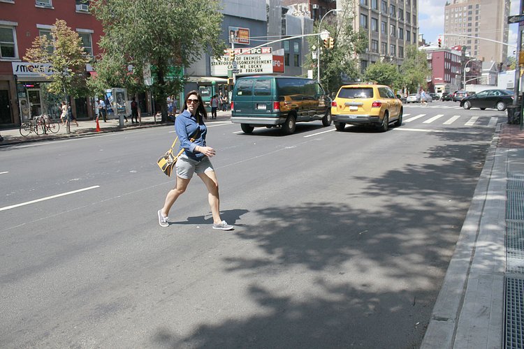 Woman Jaywalking with Confidence | You can use this photo for non-commercial purposes if you give credit, under this <a href="https://creativecommons.org/licenses/by-nc/3.0/us/" rel="nofollow">Creative Commons license</a>. For-profit media organizations also may use this, but as editorial content only (as illustrations for stories, for example, but not as advertising). Credit must read: Louise Ma / WNYC

We'd love to know if you're using this photo - send us an email (jkeefe@wnyc.org)!