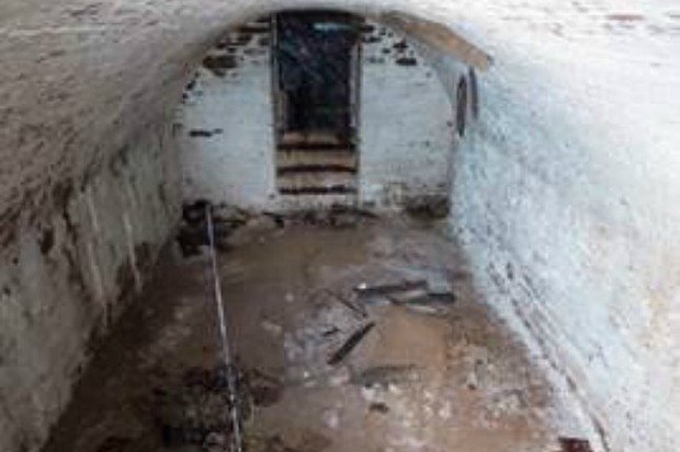 A burial vault was uncovered by a water main project at Washington Square Park, city officials said.