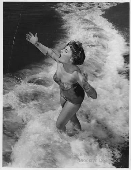 Taking a dip while accessorized in 1952.