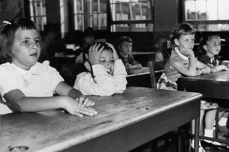 1950s - September 1957: The first day elicits varied reactions from first graders.