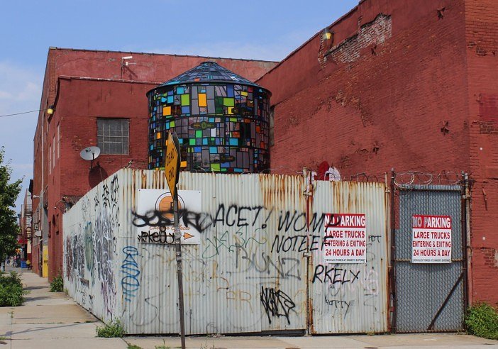 "Dutch Masters" stained glass water tower by artist Tom Fruin at Ray Smith Studio.