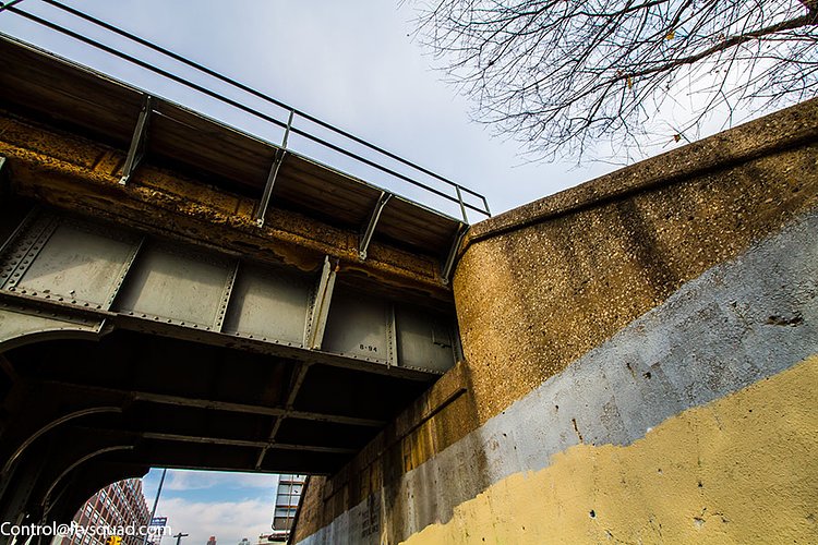 Notation on the side of the Hunterspoint Avenue overpass is date stamped for August 1994 – the last time it was painted